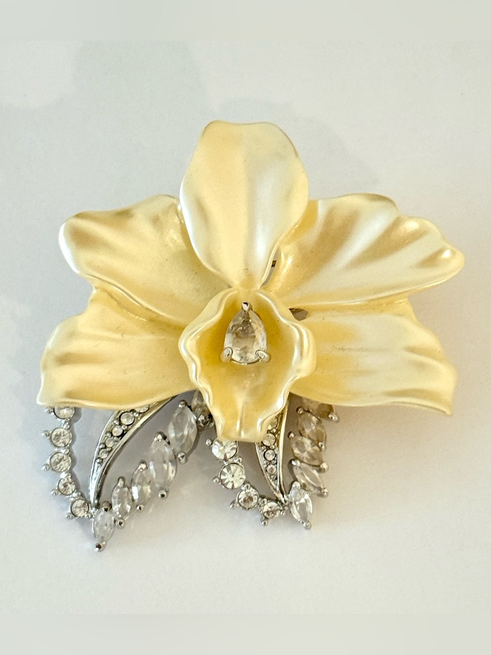Nolan Miller Glamour Collection Rhinestone Orchid Brooch Plastic Silver Tone